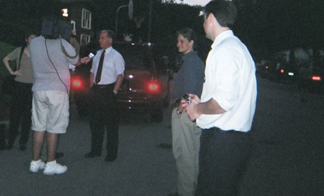 BigDeanArrives: Howard Dean talks to TV cameras en route to NH house party.