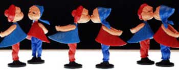 KissDolls: Boy and girl plastic kissing dolls. Can you say kiss kitsch?