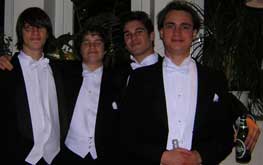 NobelKids: Four kids in white tie and tails<br />“><br />
These happy teenagers in white tie and tails went to last year’s Nobel festivities–according to the <a href = 